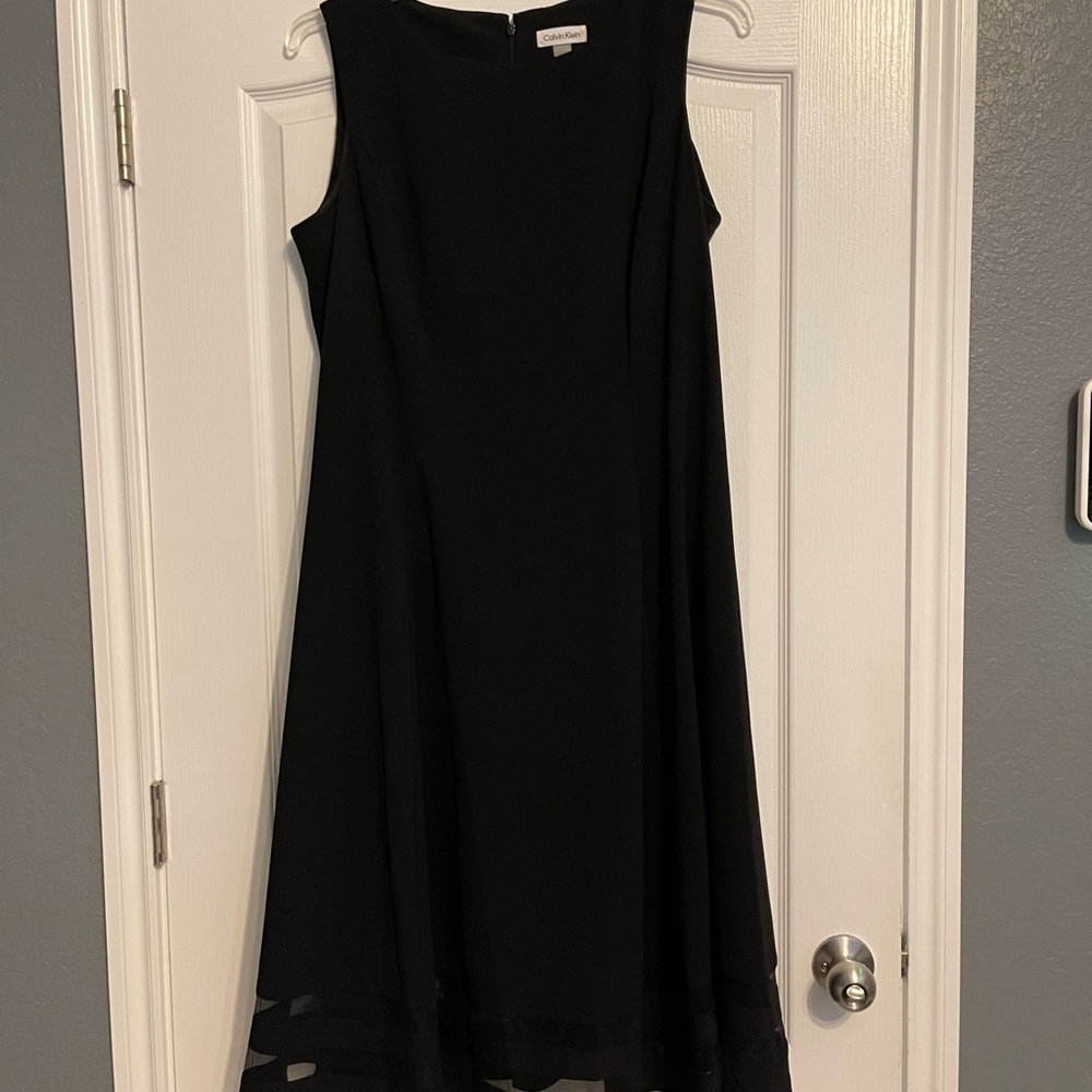 Calvin Klein tea length black sleeveless dress. Fully-lined size 14W